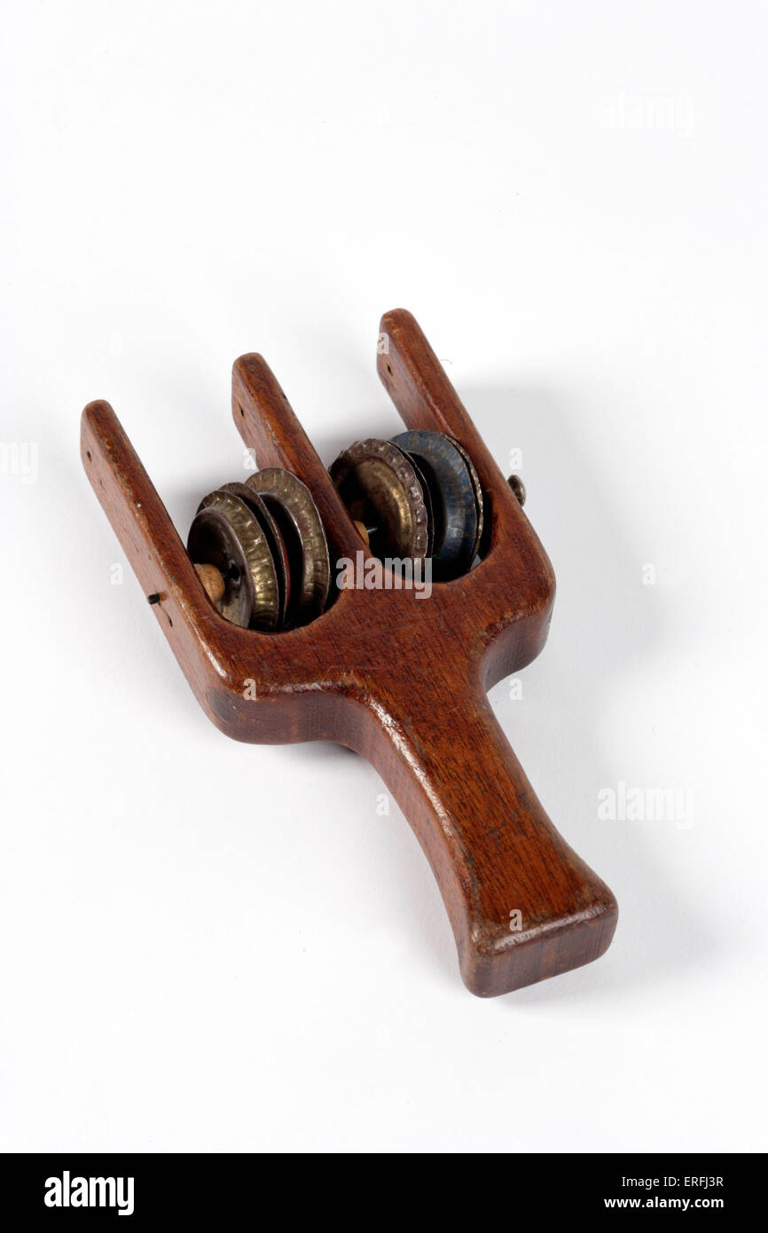 Sistrum - percussion instrument White background Stock Photo - Alamy