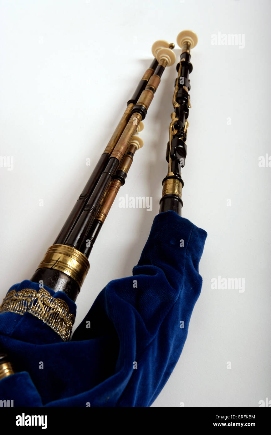 Northumbrian pipes . Close-up of the drones, chanter and part of the bag. White background. Stock Photo
