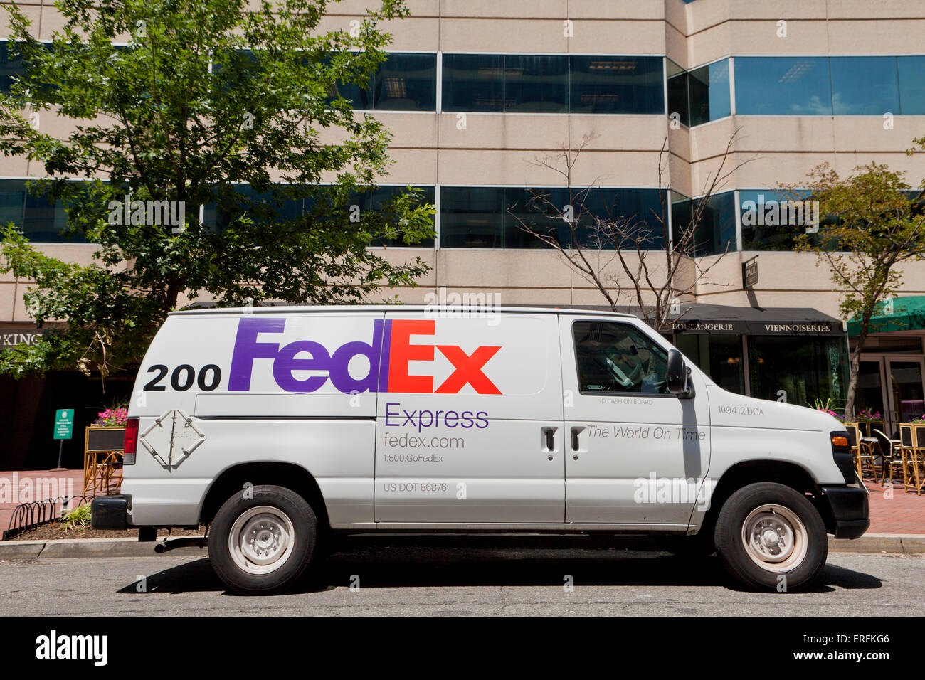 FedEx truck parked in front of office buildings - Washington, DC USA Stock Photo