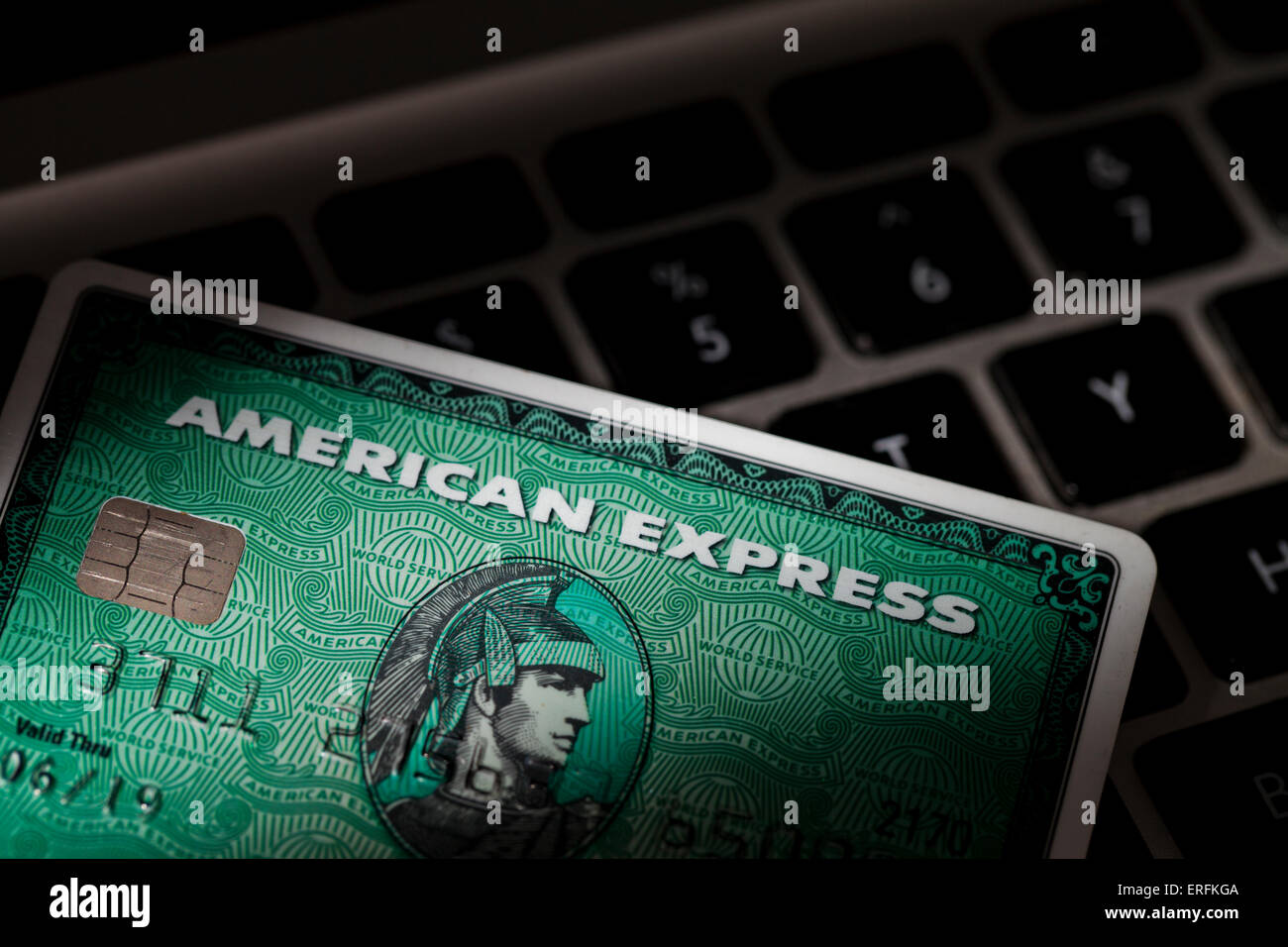 American Express Credit card on computer keyboard - USA Stock