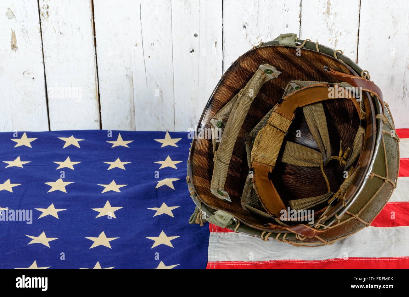 wwii military helmet on american flag Stock Photo - Alamy