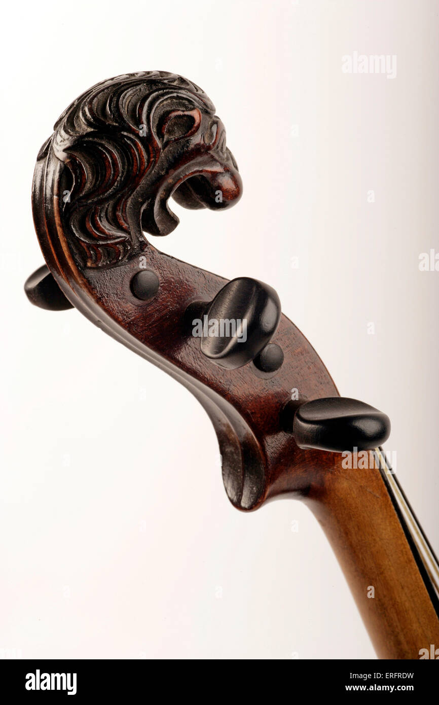 Violin scroll carved in the shape of a lions head, with gut strings