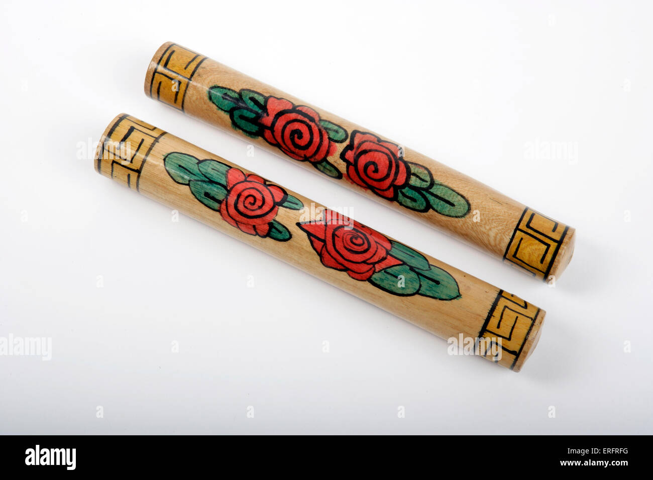 Decorated Claves - Percussion instrument. Stock Photo