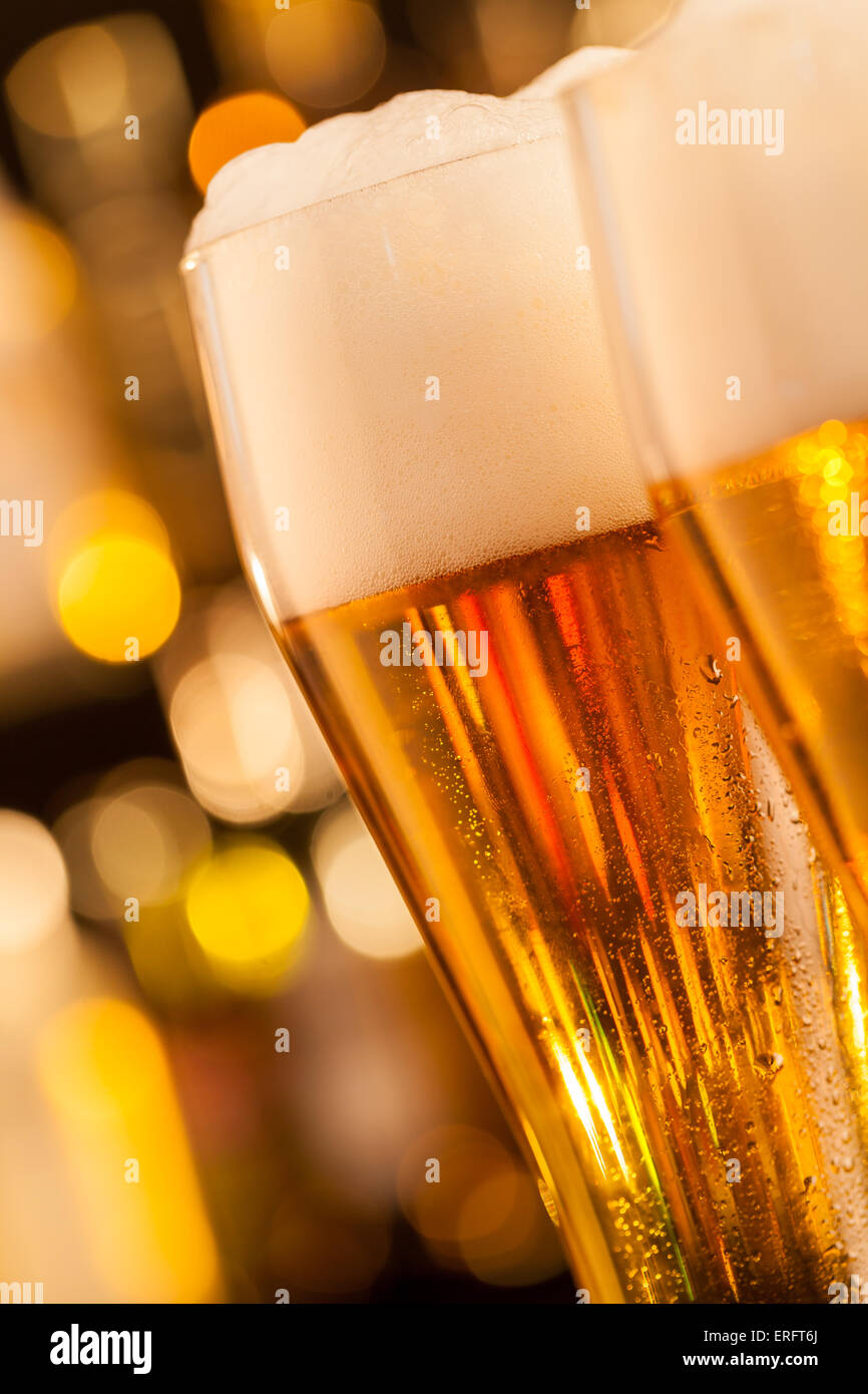 Close-up of jug of beer placed on bar counter Stock Photo