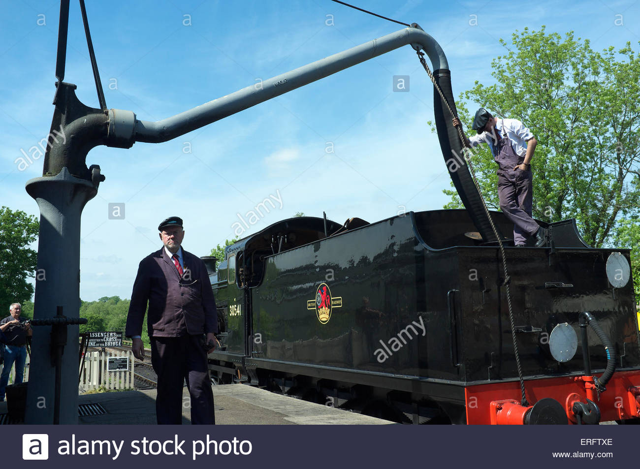 Steam Train Filling Water High Resolution Stock Photography and Images