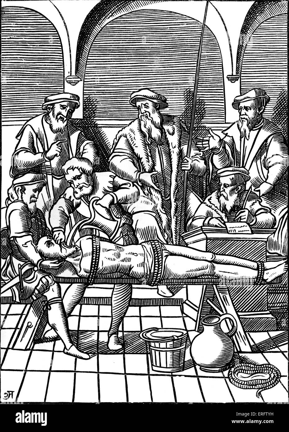 Medieval torture scene. French water torture: the man has nine pints of water poured down his throat. Woodcut from 'Praxis Stock Photo