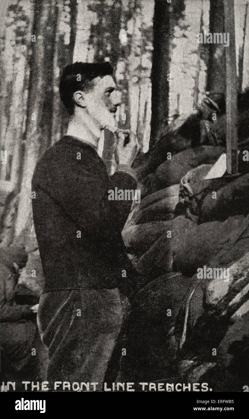 World War I 'In The Front Line Trenches'. Soldier shaving himself in
