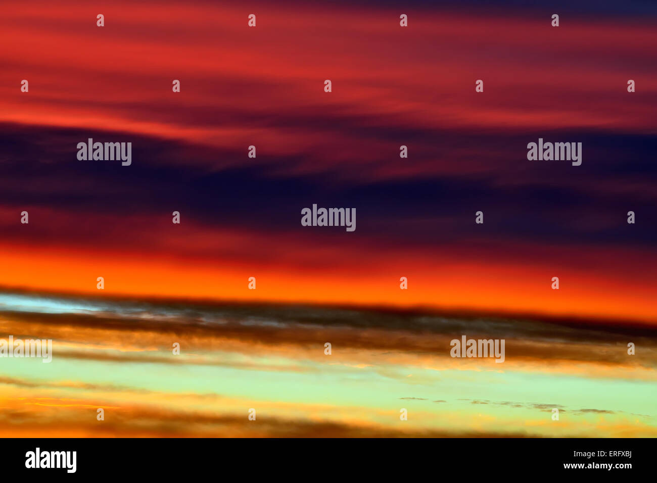 Heavenly landscape with dramatic crimson sunset clouds Stock Photo - Alamy