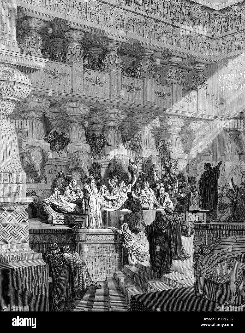 Daniel interprets the writing on the wall in the court of Babylon