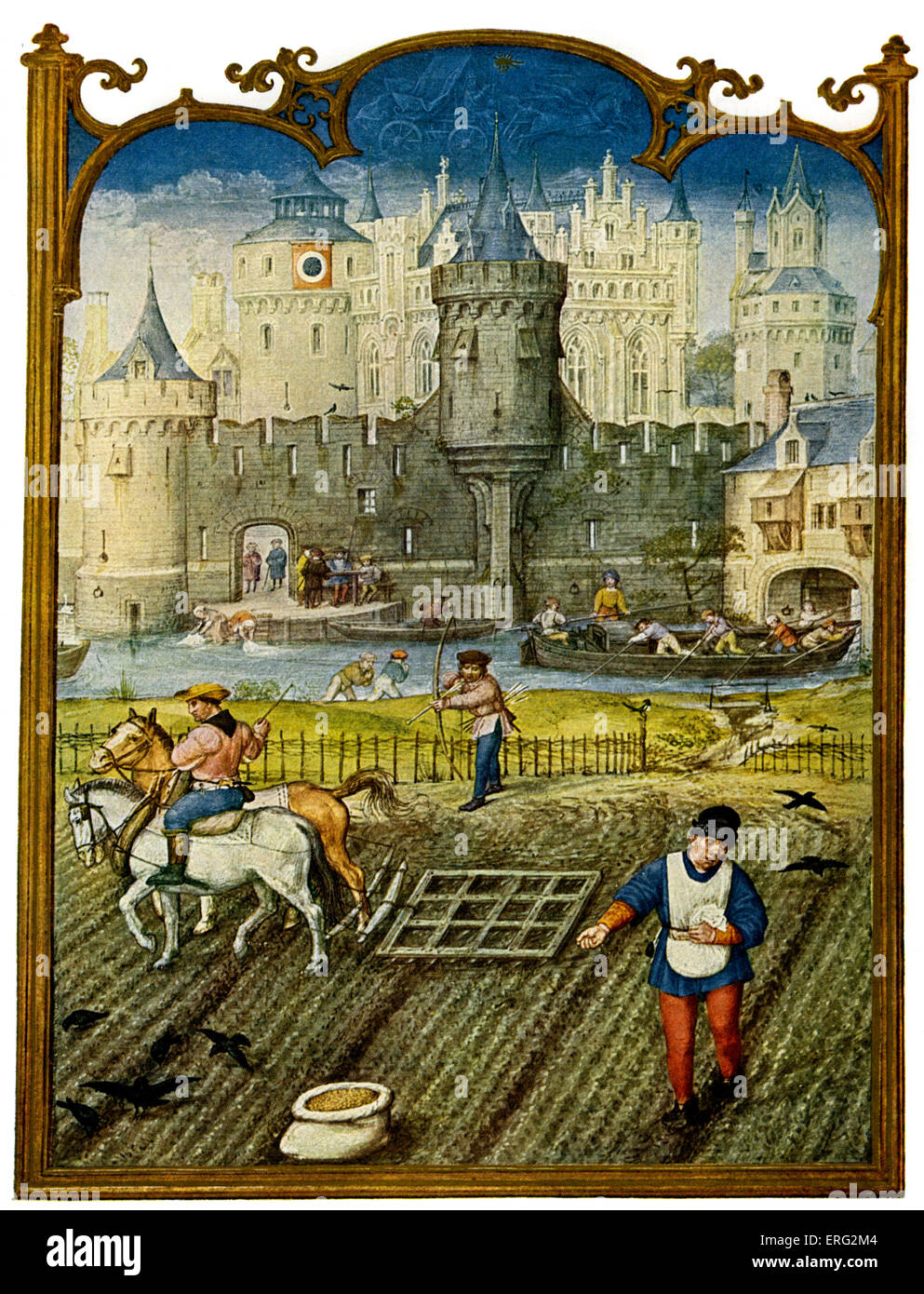 Country life a scene showing a field  being ploughed against the backdrop of a fortified town in the late Middle Ages.  A Stock Photo