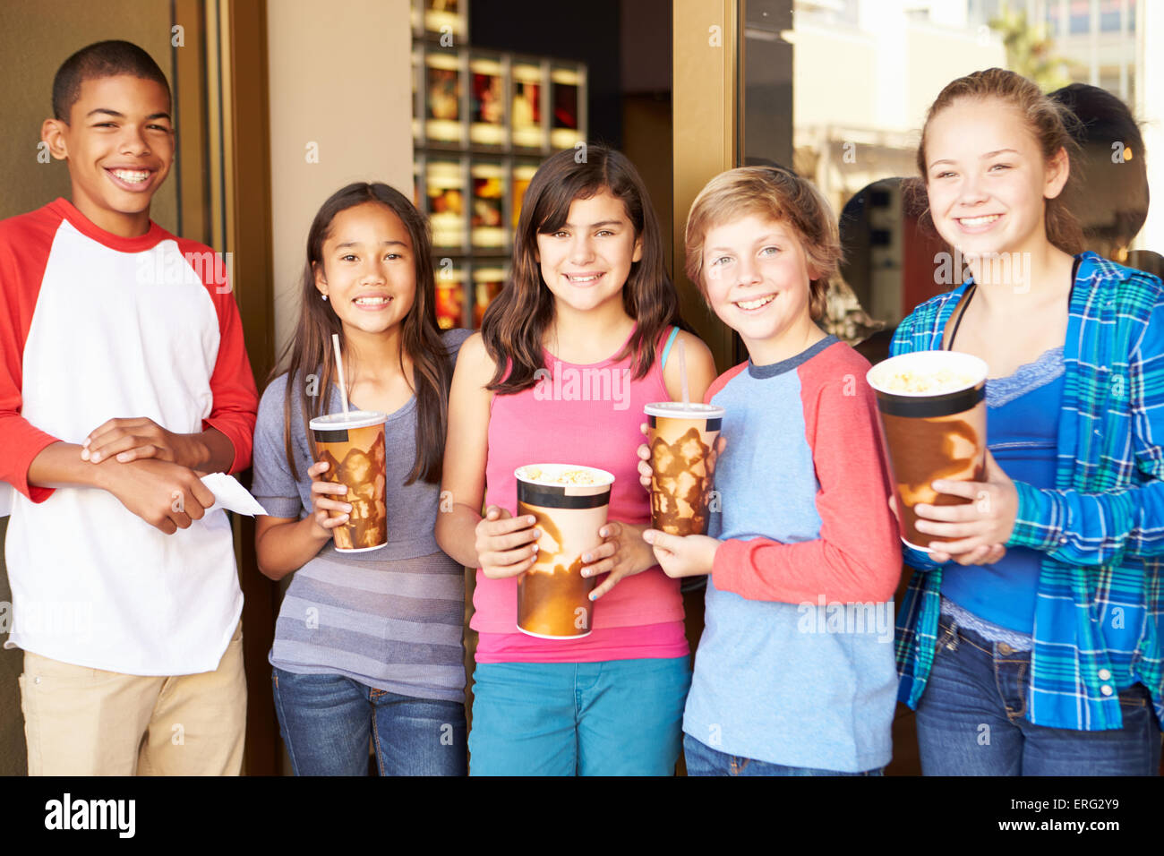 Group Of Children Standing Outside Cinema Together Stock Photo
