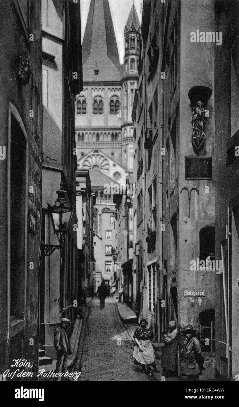 Cologne, Germany. Auf dem Rothenberg. Groß St. Martin (view of Great Saint Martin Church from an alley).  Postcard. Stock Photo