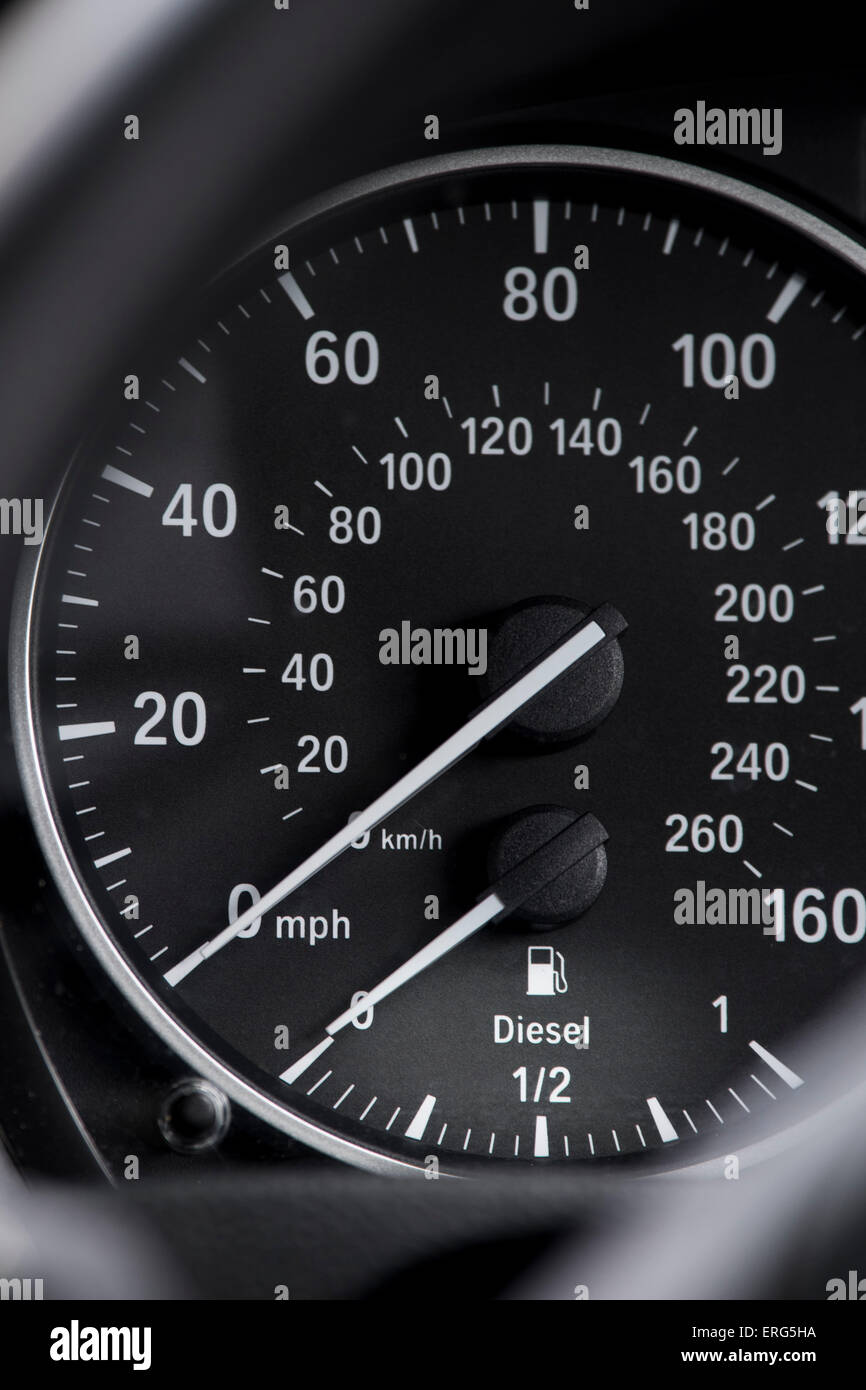 A car speedo speedometer showing an empty tank of diesel fuel Stock
