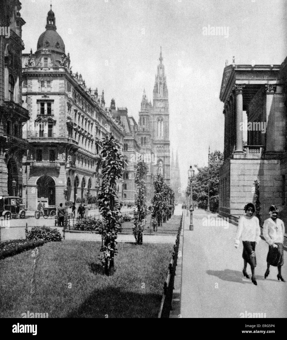 Townhall and Parliament in Vienna,, ('Zwischen Parlament und Rathaus'), Austria.  1920s. Street scene. Rathaus designed by Stock Photo