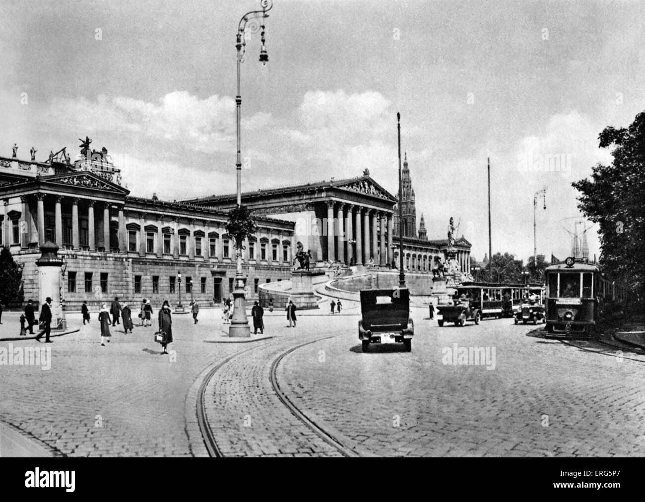 Parliament ('Parlament') in Vienna, 1920s. Street scene, with trams and cars. Stock Photo