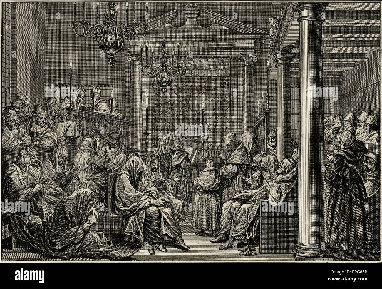 Day of Atonement / Yom Kippur in the synagogue according to the German custom.. 1723. Men wearing prayer shawls, without shoes as they are fasting. Stock Photo