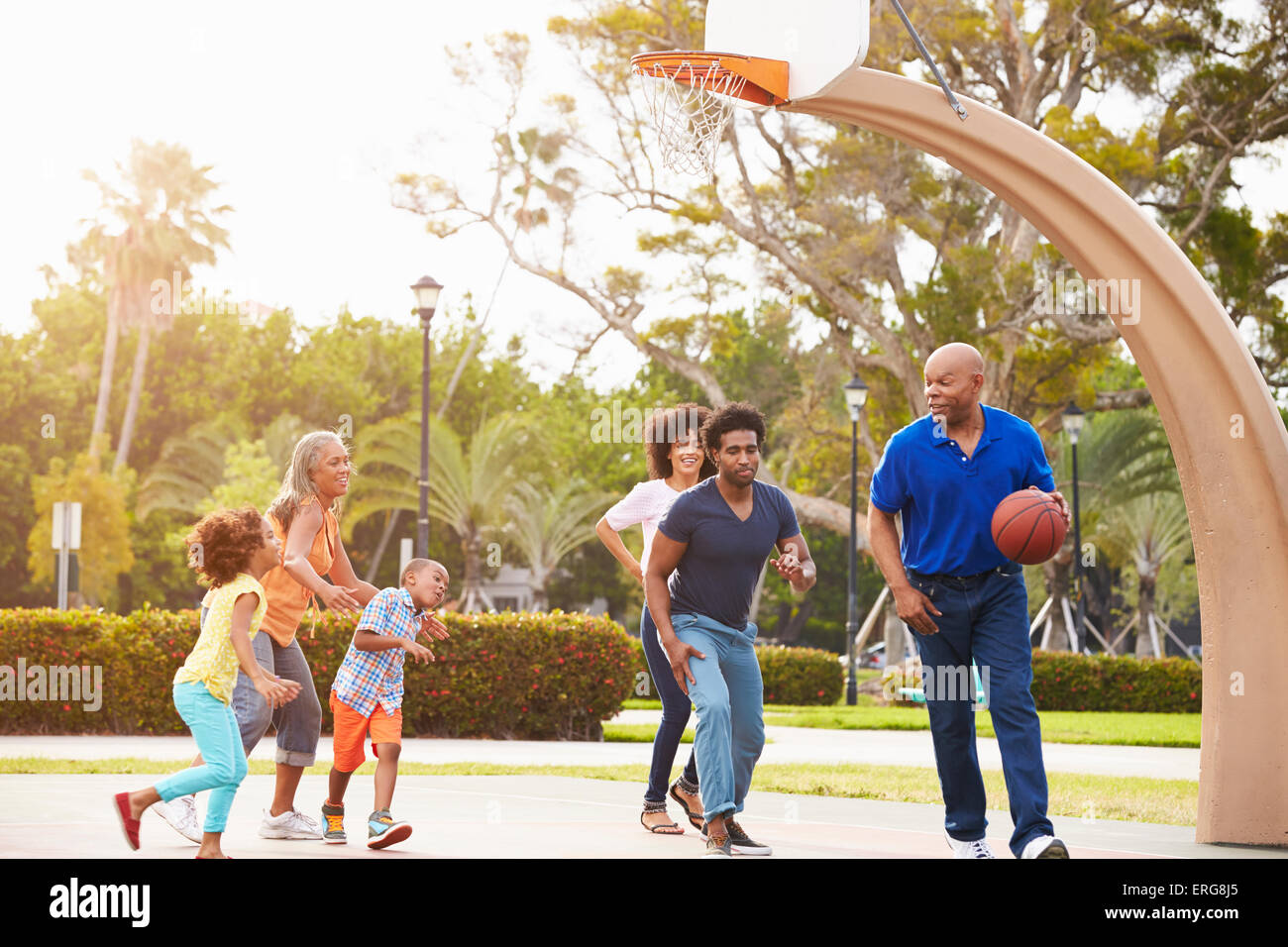 Multi Generation Family Playing Basketball Together Stock Photo - Alamy