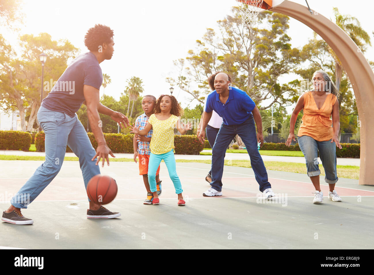 Multi Generation Family Playing Basketball Together Stock Photo - Alamy
