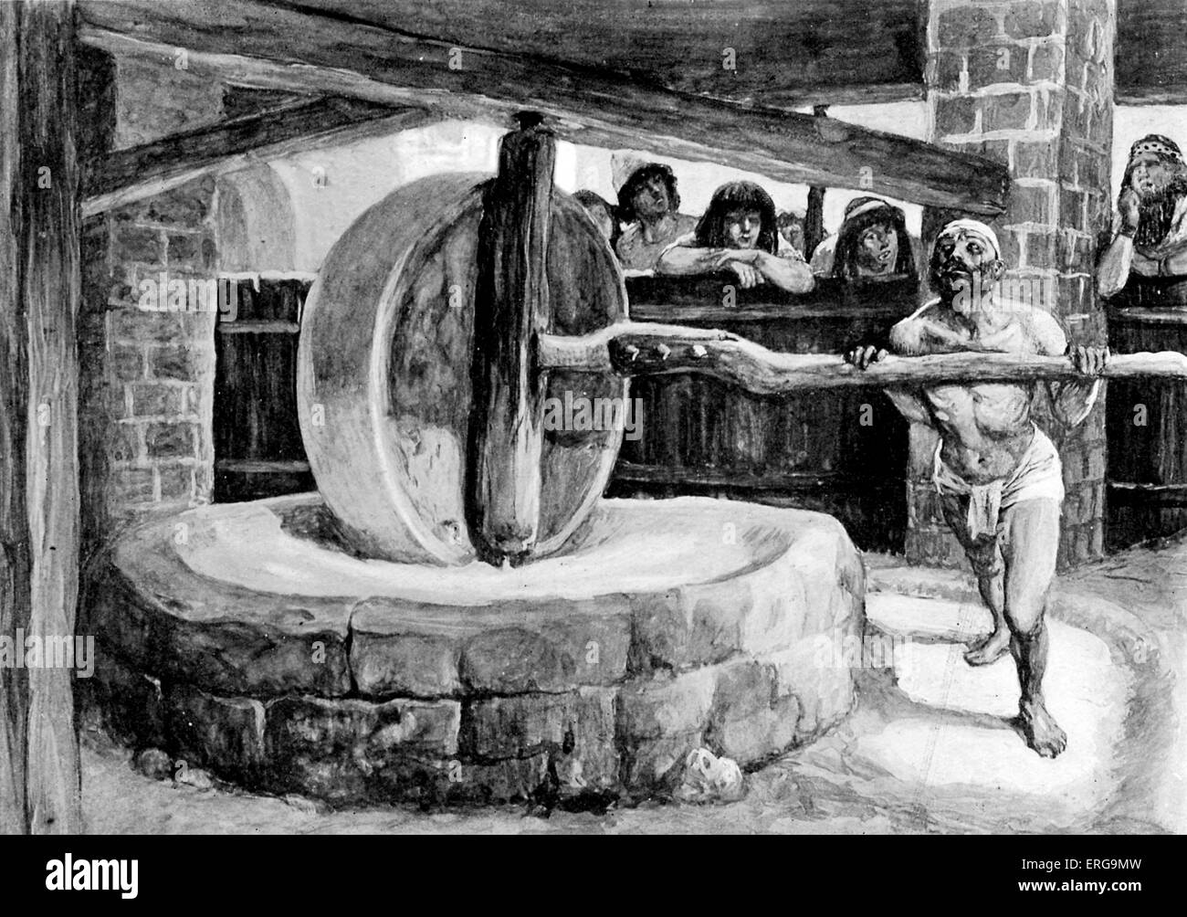 'Samson turns the mill in prison' by J James Tissot. Illustration to Book of Judges, 16.21: 'But the Philistines took him, and Stock Photo