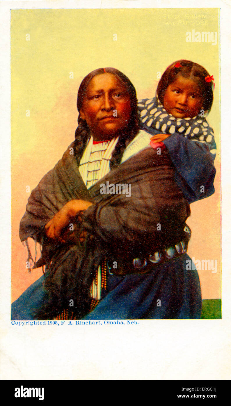 American Indian Mother and Child, wearing traditional costume. Photograph taken by F. A. Rinehart, 1905, Omaha, Nebraska. Stock Photo