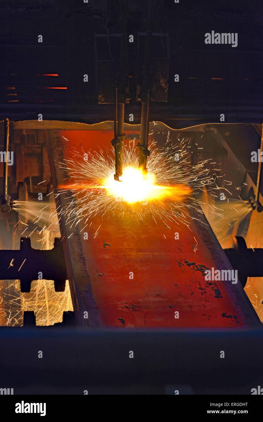 Fire gas cutting steel plate Stock Photo