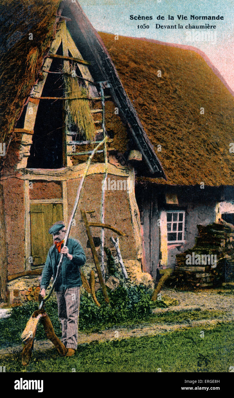 Life in Normandy - in front of the thatched cottage ('Devant la chaumière'). Stock Photo