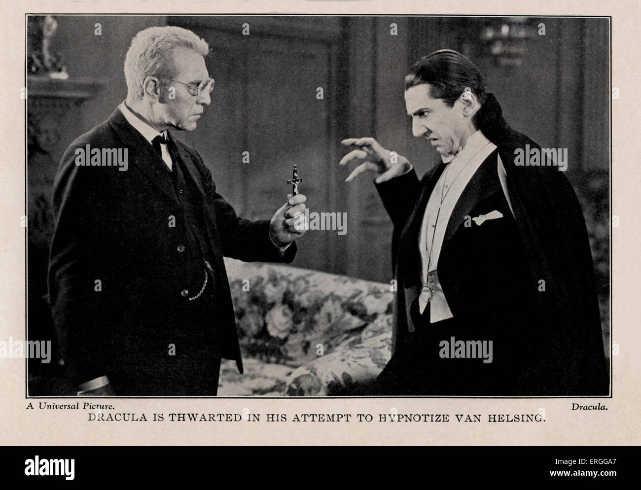 Dracula - 1931 film. Bela Lugosi as Count Dracula and Edward Van Sloan as Van Helsing. Caption: 'Dracula is thwarted in his Stock Photo