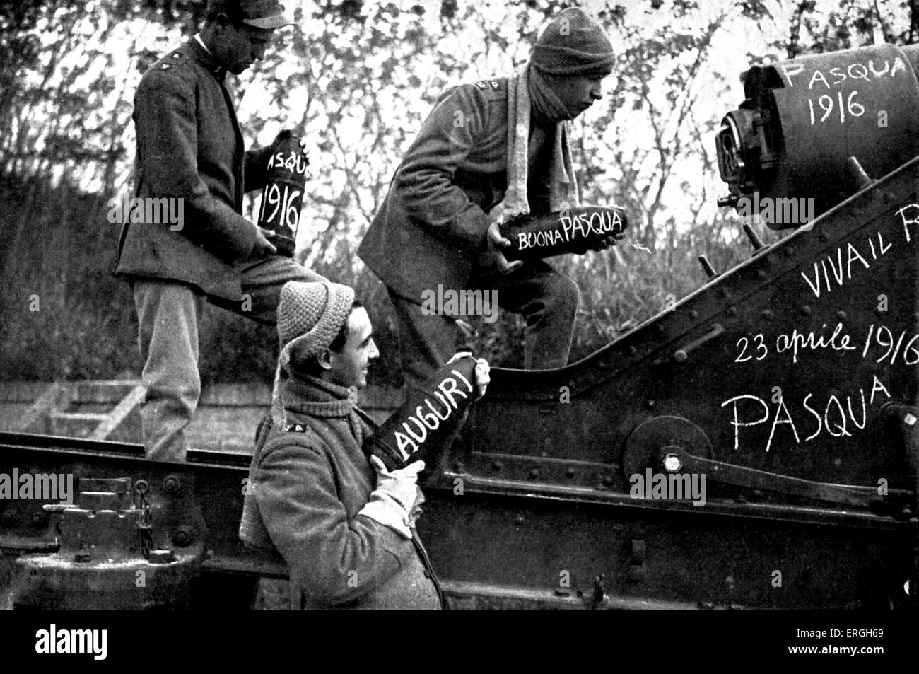 World War 1: Italian artillery gunners at Easter 1916. Munition shells have East messages written on them ('Buona Pasqua'/ Stock Photo
