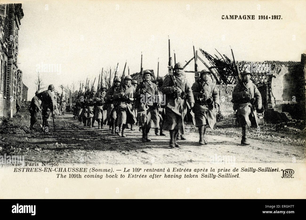 World War 1: 109th French division marching  in to Estrées-en-Chaussée after taking Sailly-Saillisel in the Somme, Picardy, Stock Photo