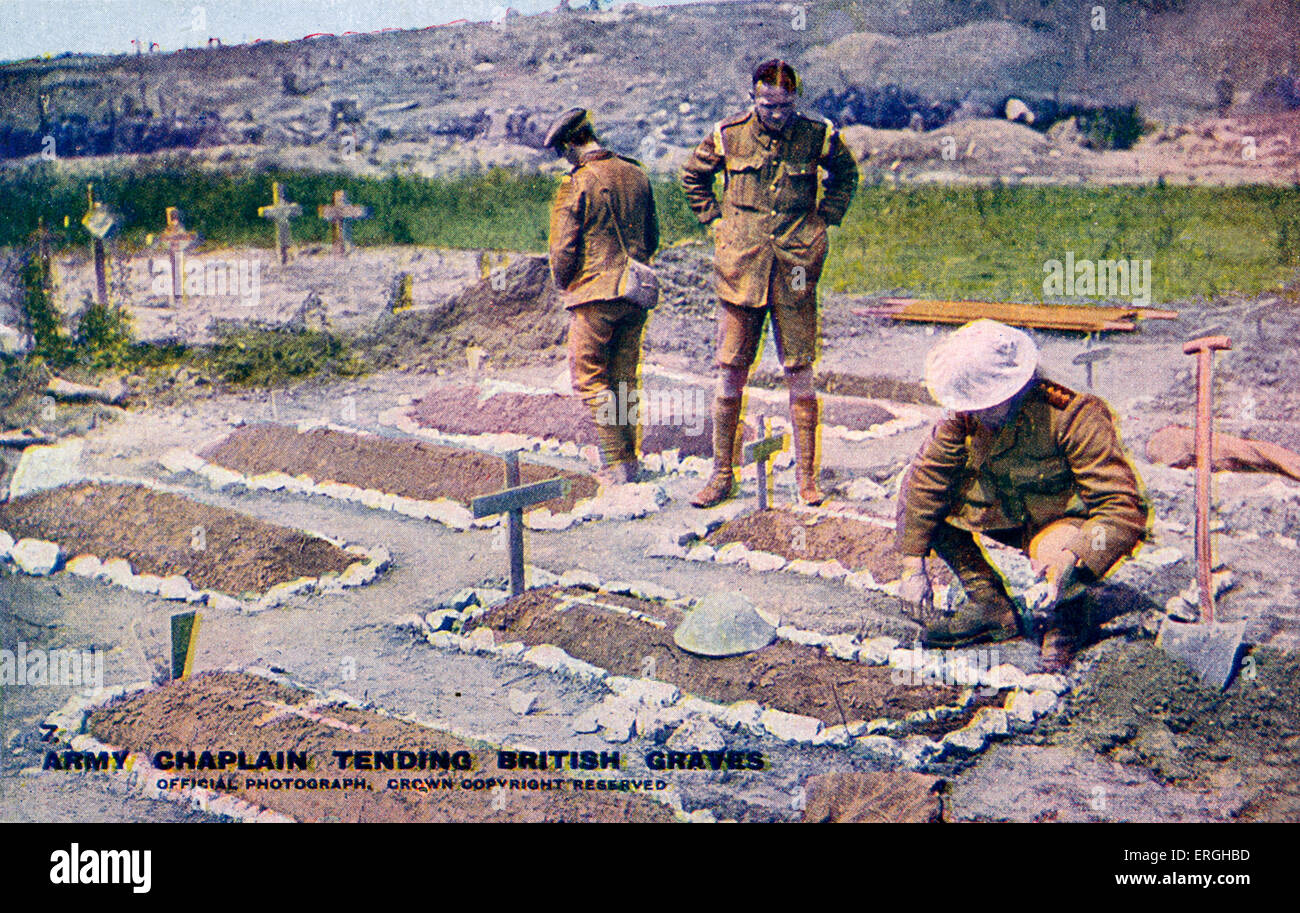 World War 1: British army chaplain tending to graves. Offical War Photograph published on postcard. Series 1. No. 7. Caption on Stock Photo