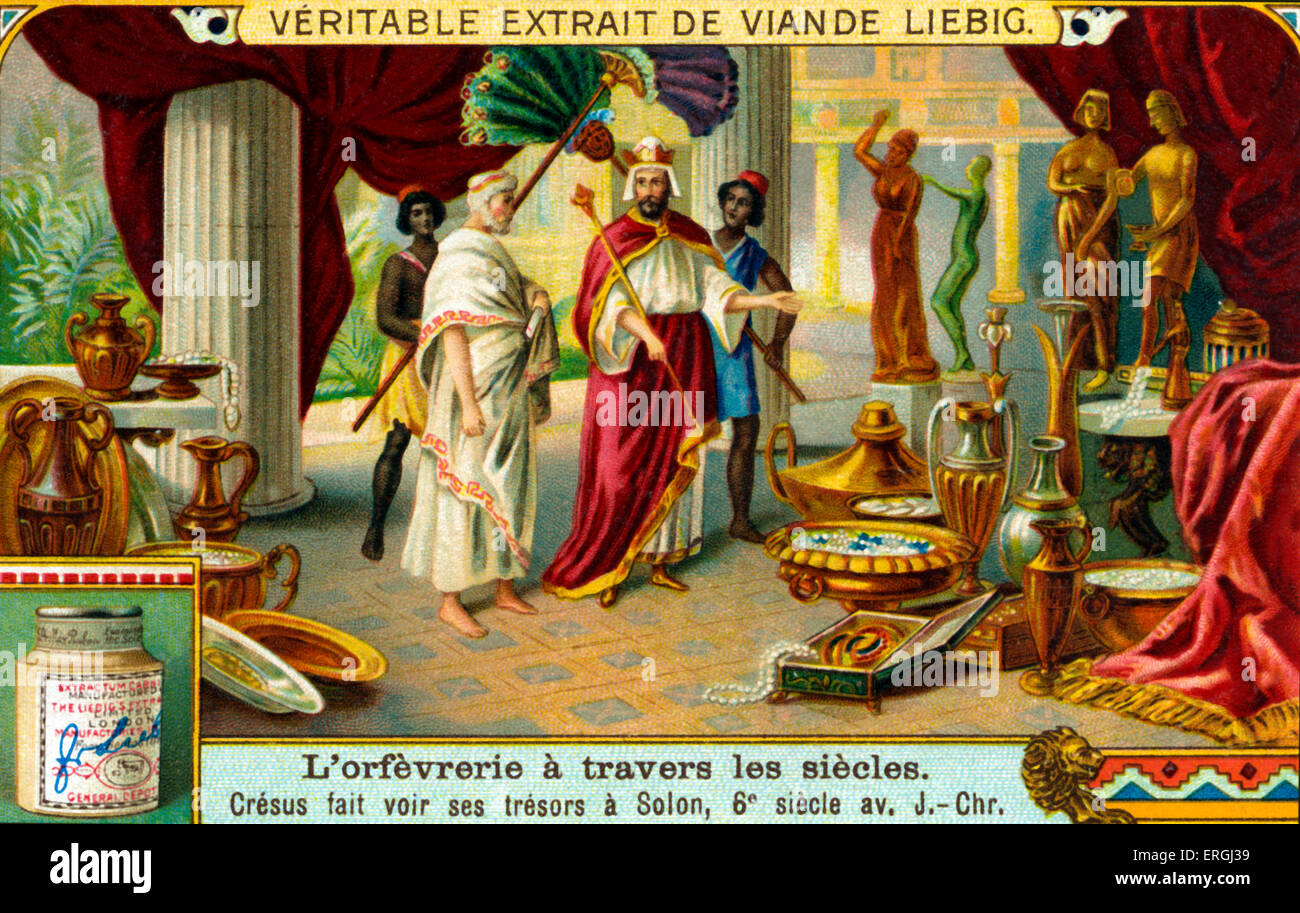 History of Goldsmithery: Croesus showing his treasures to Solon. Liebig collectible card series: 'Goldsmithery through the Ages' (French: 'L'orfèvrerie à travers les siècles'). 1921. C: king of Lydia from 560 to 547 BC. Stock Photo