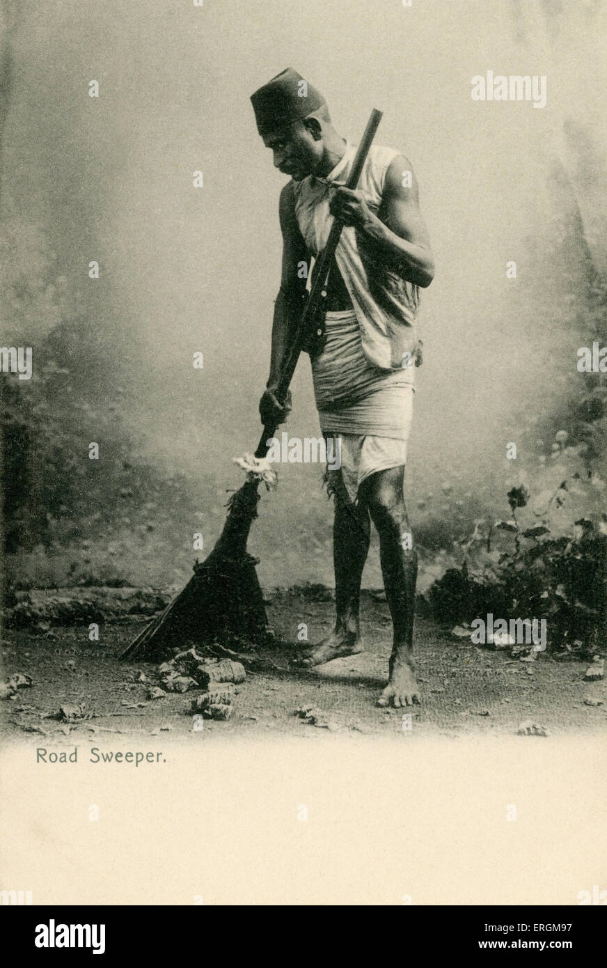An Indian road sweeper. Photograph from early 20th century. Stock Photo