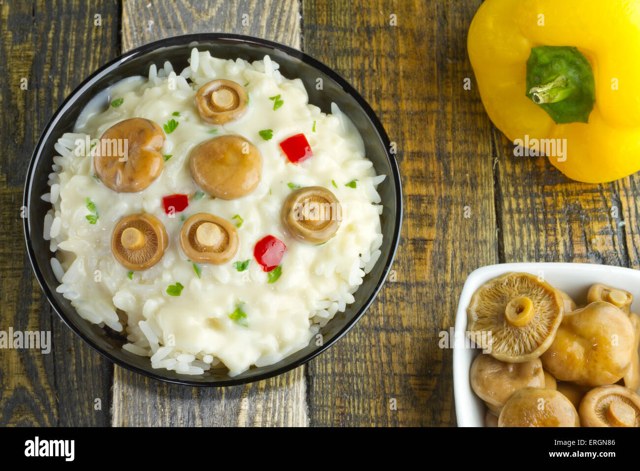 Saffron Milk Cap mushroom rice with white wine sauce on a bowl on