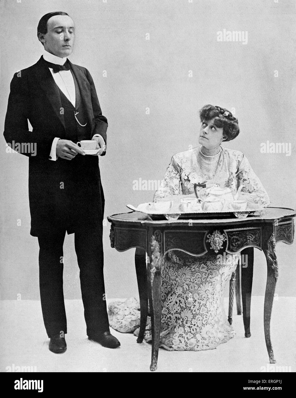 J M Barrie 'The Admirable Crichton', comedy written in 1902. Harry Brodribb Irving as Crichton and Dame Irene Vanbrugh as Lady Mary. Crichton: - I am ashamed to be seen talking to you, my lady. Lady Mary: - To such a perfect servant as you, all this must be most distasteful.Play Pictorial photograph. JMB: Scottish novelist and playwright, 9 May 1860 – 19 June 1937. HBI: British actor, 5 August 1870 – 17 October 1919. IV: English actress, 2 December 1872 – 30 November 1949. Stock Photo