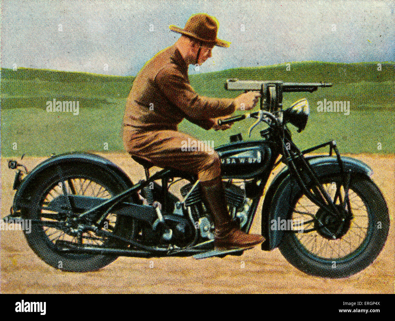 American soldier of military  motorcycle unit with machine gun fixed. Ammunition chamber holds 50 shots.    (Sour4e: Cigarette Stock Photo