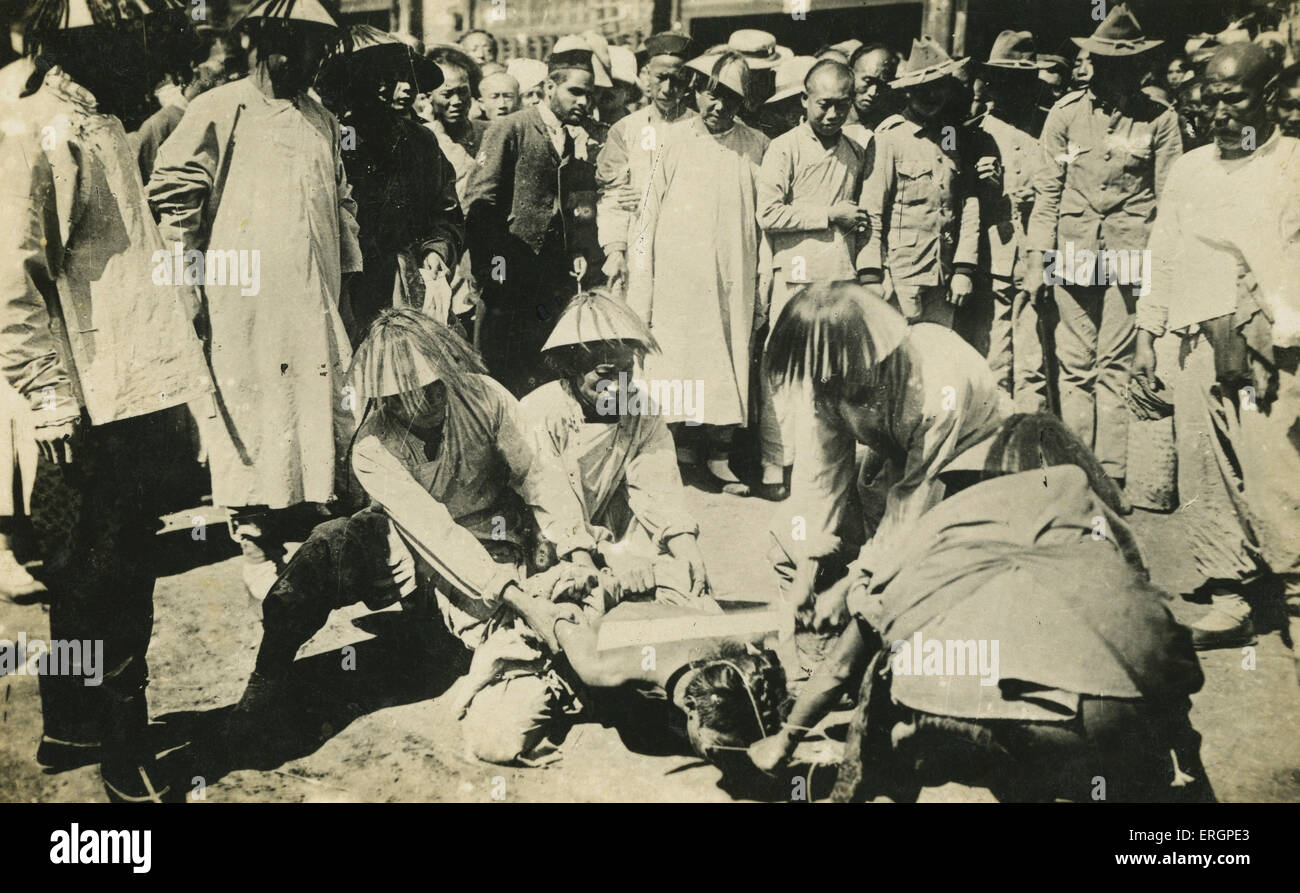 Execution by beheading, China, early 20th century. Decapitated Stock Photo