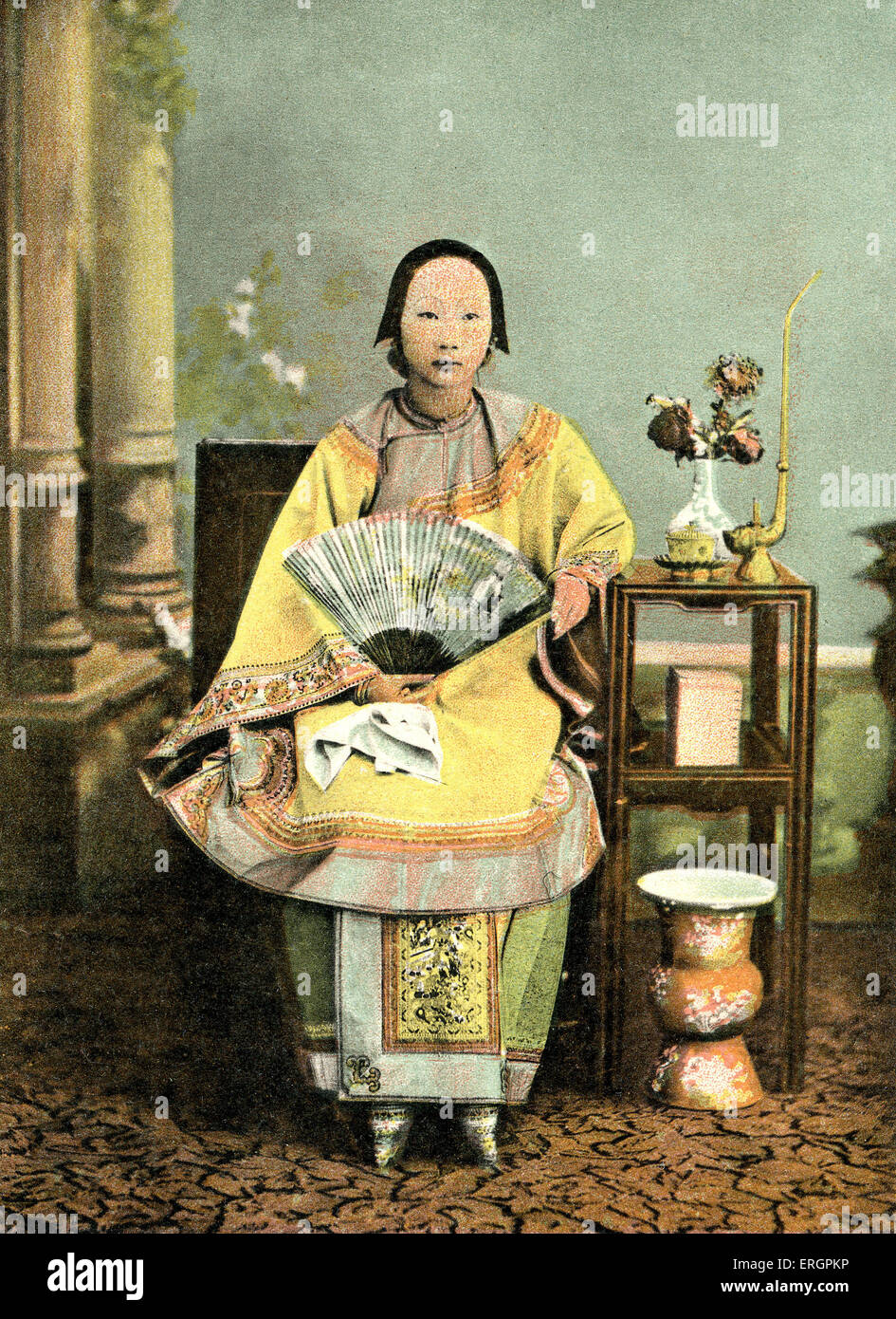 Chinese lady with bound feet. Early 20th century. China, Hong Kong under British administration. Stock Photo