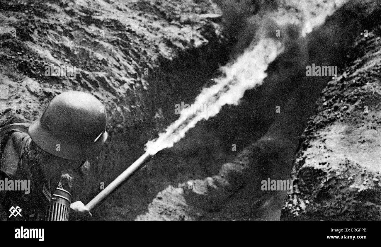 WW2 - German soldier with flamethrower clears trench. German postcard, Wehrmacht-Bildserie / German armed forces series. Stock Photo