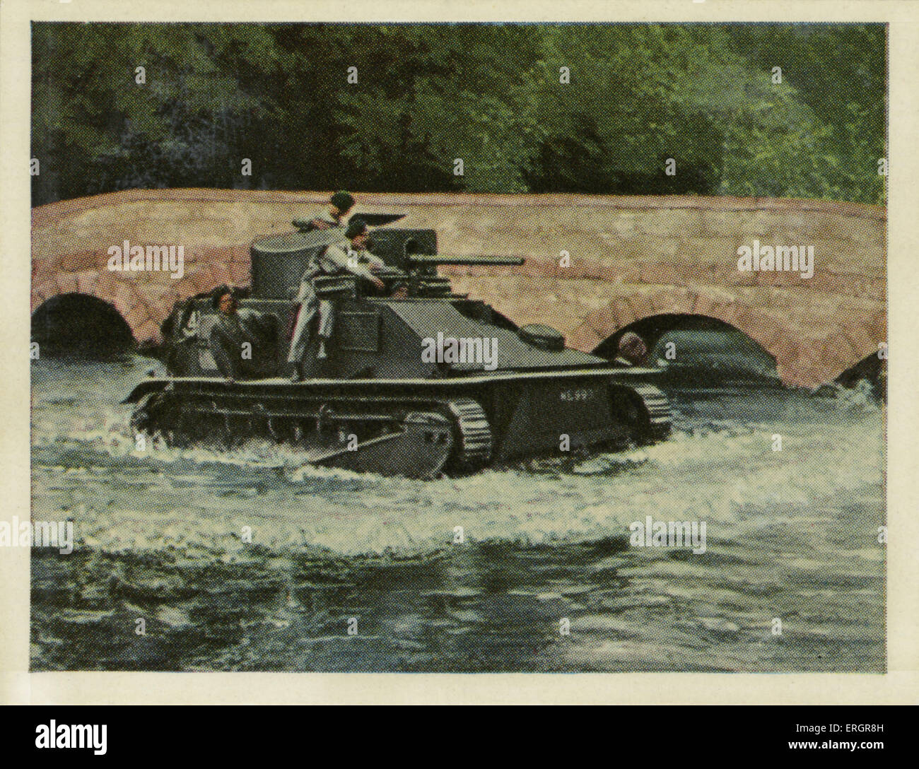 English Vickers tank  crossing water.  amphibious     (Source: Cigarette cards published in Germany c.1934 reviewing military Stock Photo