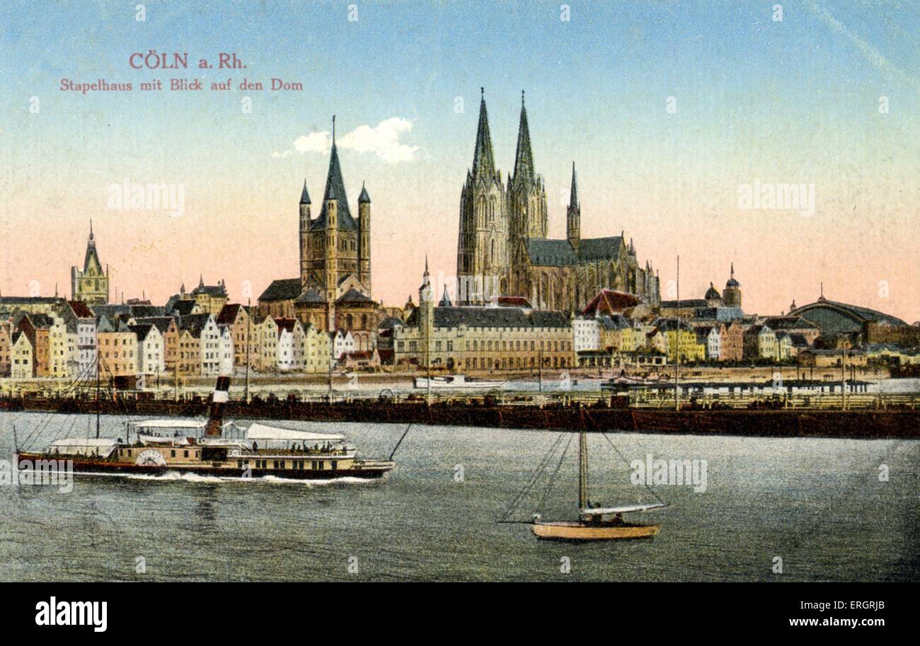 Cologne, Germany, early 20th century. View  shows cathedral  with2 spires overlooking the  river Rhine, boats .  Köln, Stock Photo