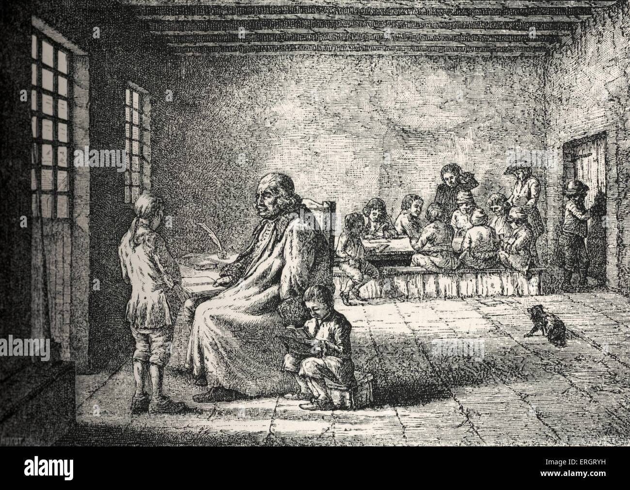 Daily life in French history: the education of children by a schoolmaster in 18th century France. Stock Photo