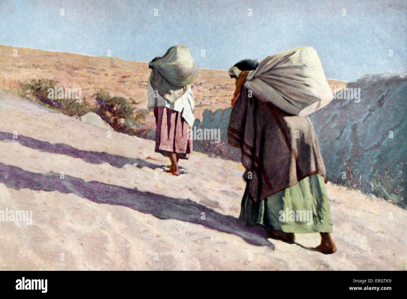 Native American women from the Hopi tribe, Arizona, carrying water from