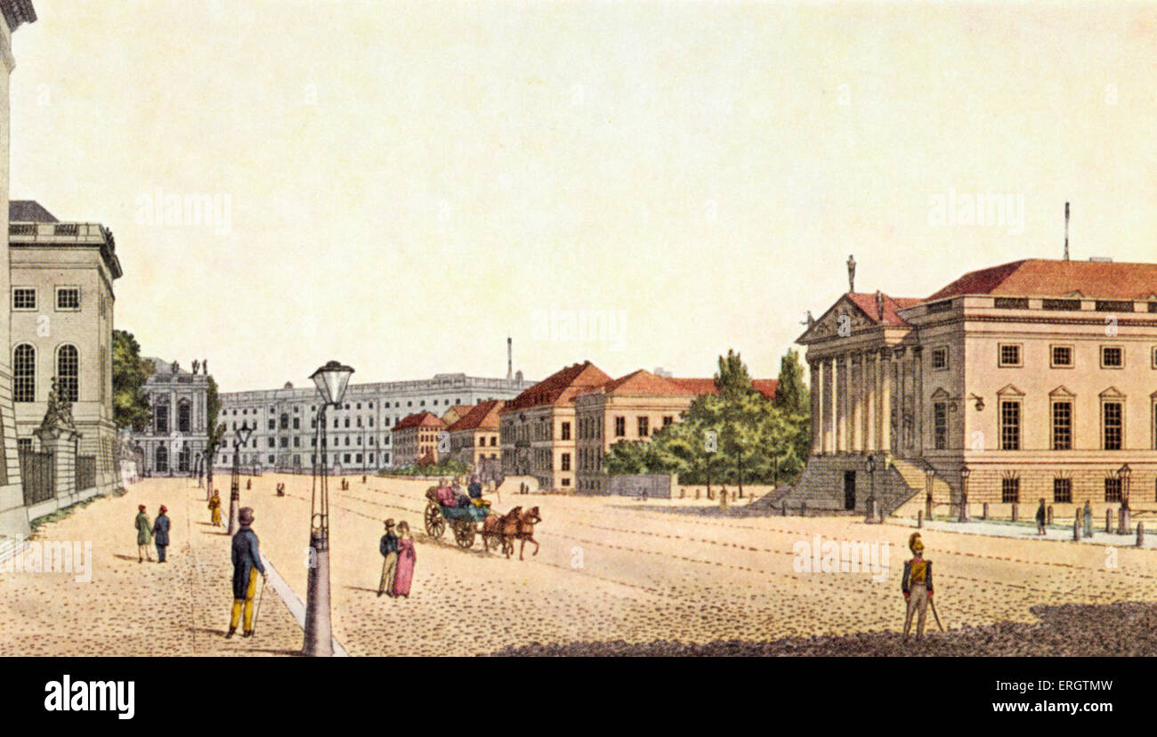 Berlin - 'Unter den Linden' boulevard and the Berlin State Opera House (Staatsoper). Street scene - with pedestrians and horse Stock Photo
