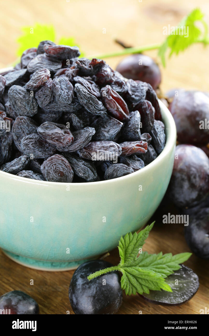 Natural organic dried grapes raisins, rustic still life Stock Photo Alamy
