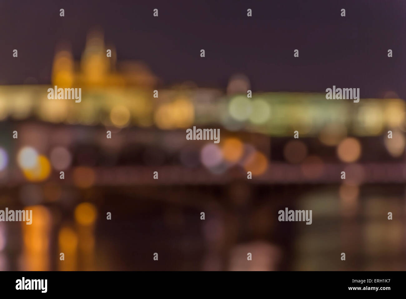 Prague panorama, abstract bokeh background. Concept of historical city at night. Stock Photo