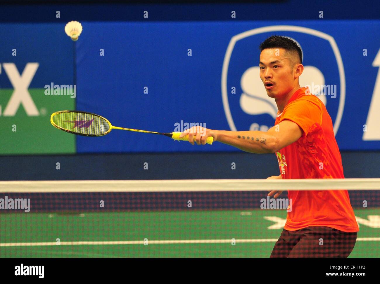 (150603) -- JAKARTA, June 3, 2015 (Xinhua) -- Lin Dan of China returns the shuttlecock to Tommy Sugiarto of Indonesia during the men's singles preliminary match at the BCA Indonesia Open 2015 in Jakarta, Indonesia, June 3, 2015. Lin lost 1-2. (Xinhua/Zulkarnain) Stock Photo