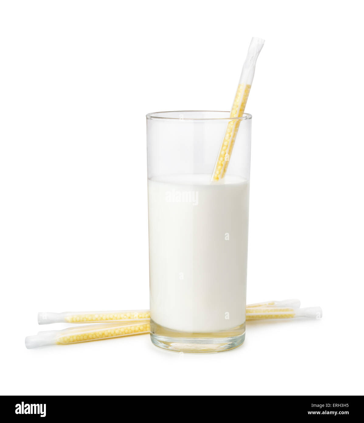 Milk with banana flavoring straws isolated on white Stock Photo