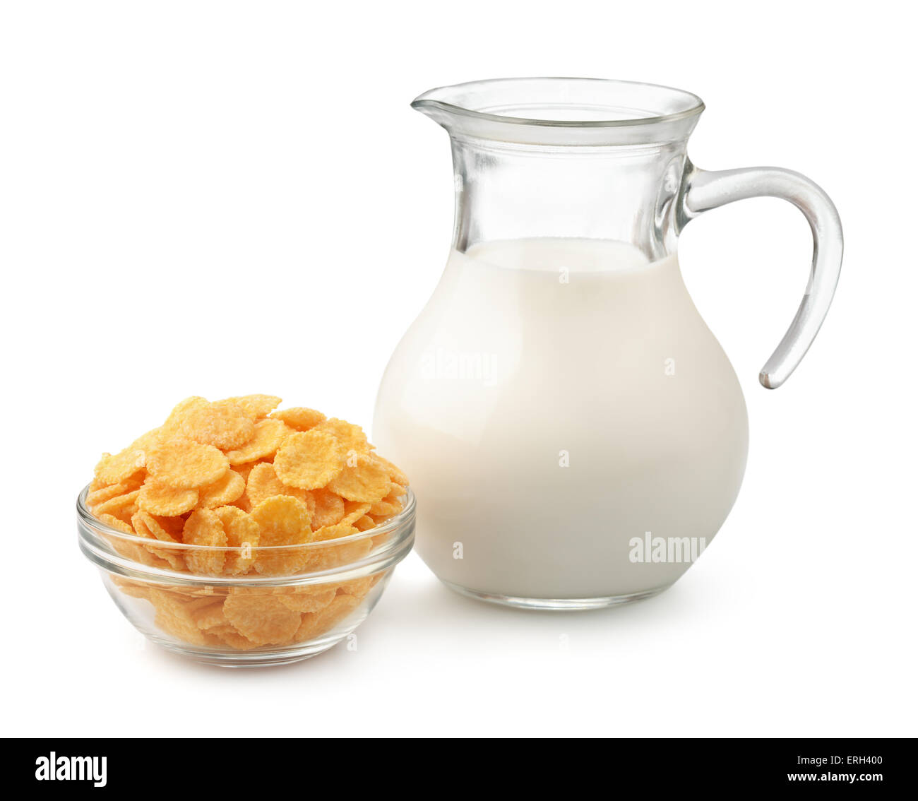 Corn flakes and jug of milk isolated on white Stock Photo