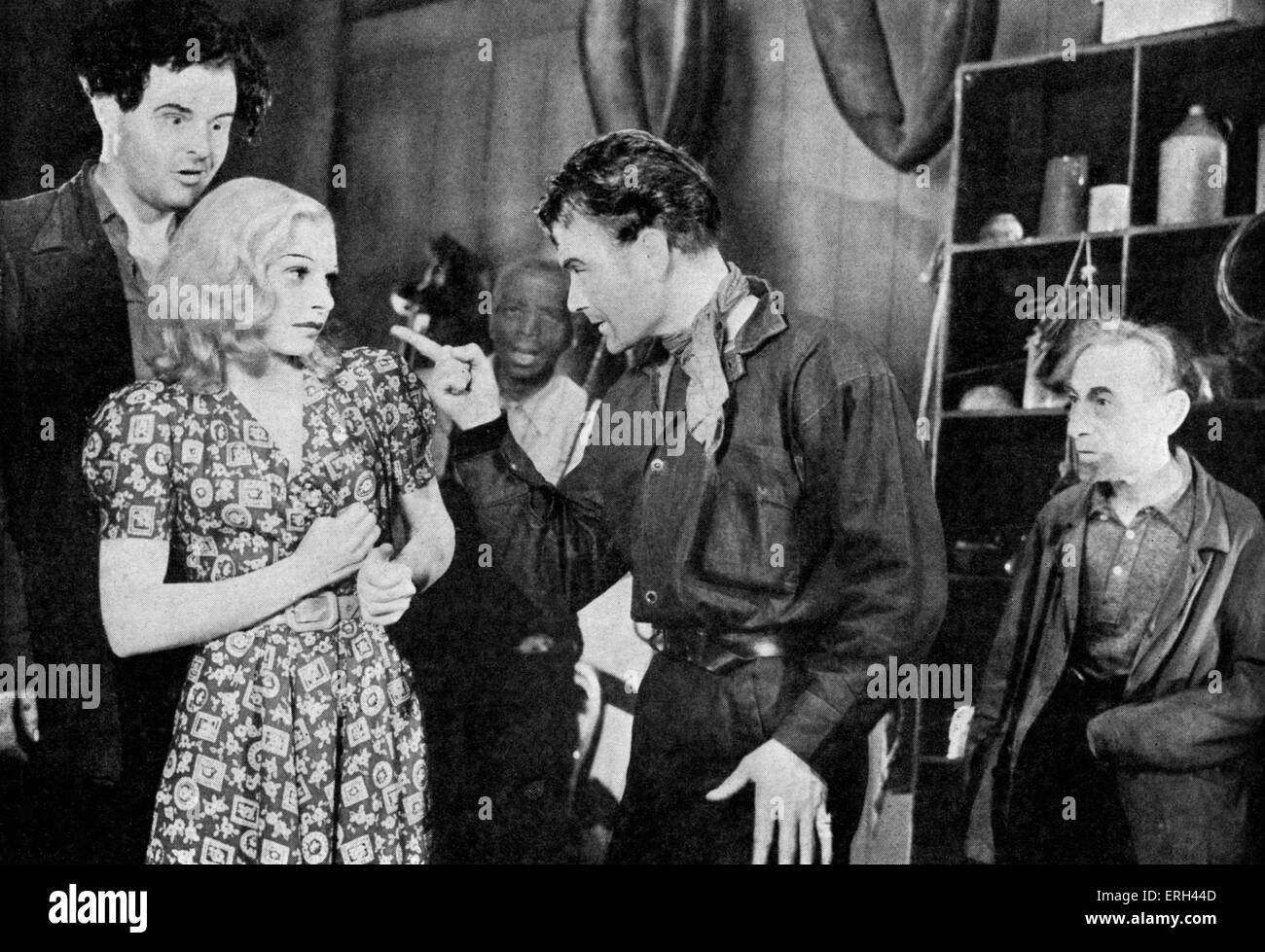 'Of Mice and Men' by John Steinbeck, with John Mills, Niall MacGinnis and Claire Luce at the Apollo Theatre, London, July 1939. Stock Photo