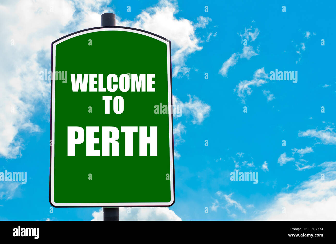 Green road sign with greeting message to PERTH isolated over clear blue sky background